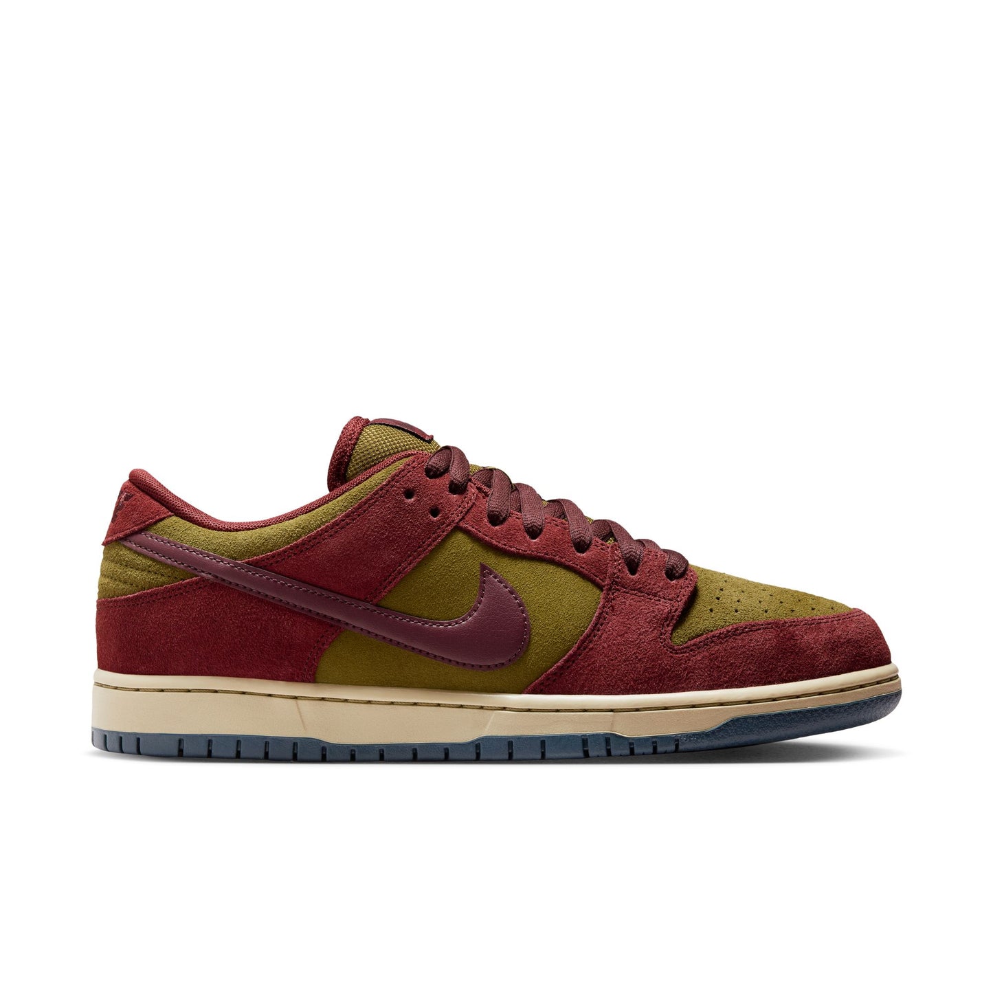 Red and green sneaker with a Nike logo on a white background