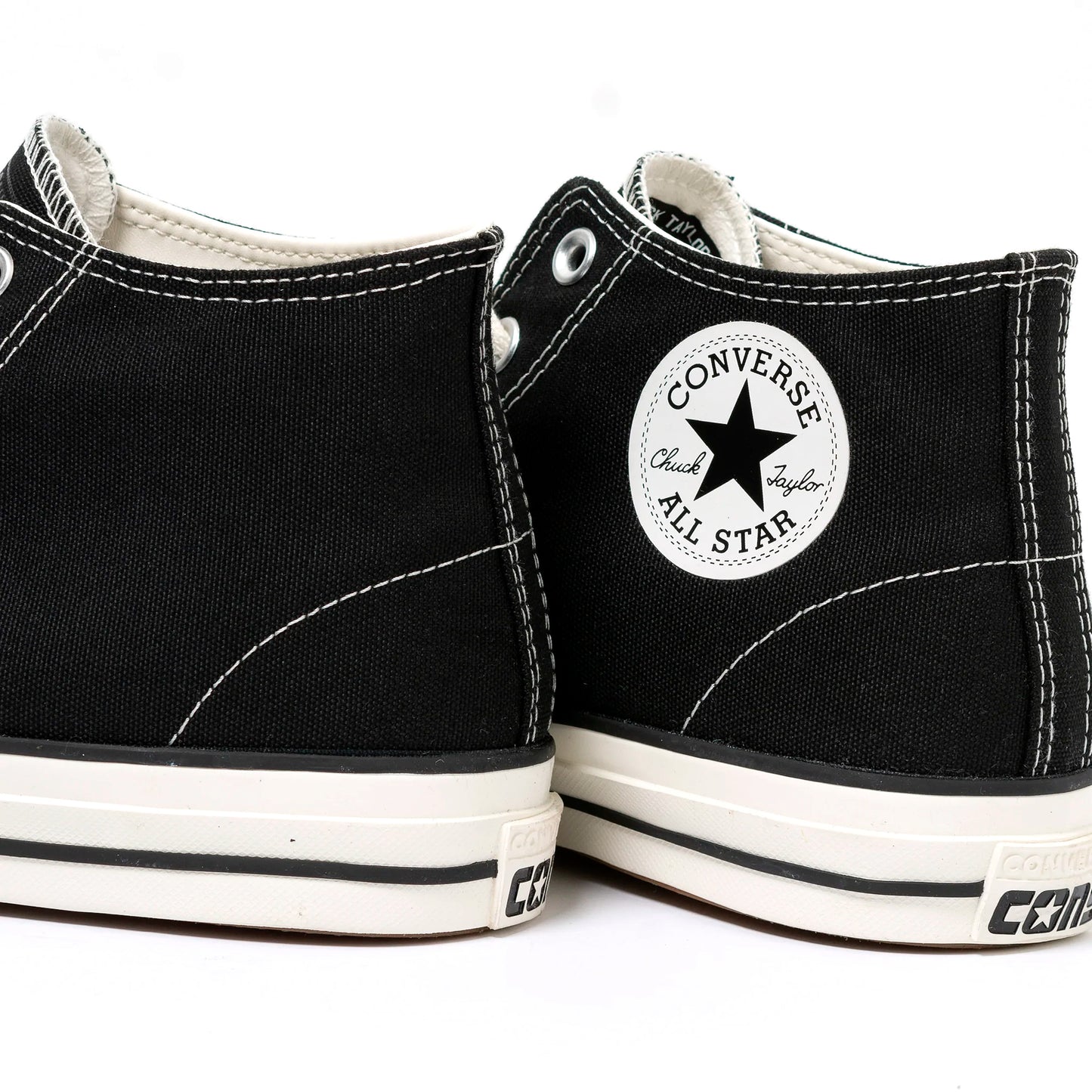 Chuck Taylor All Star Pro Mid - Black / Black / Egret