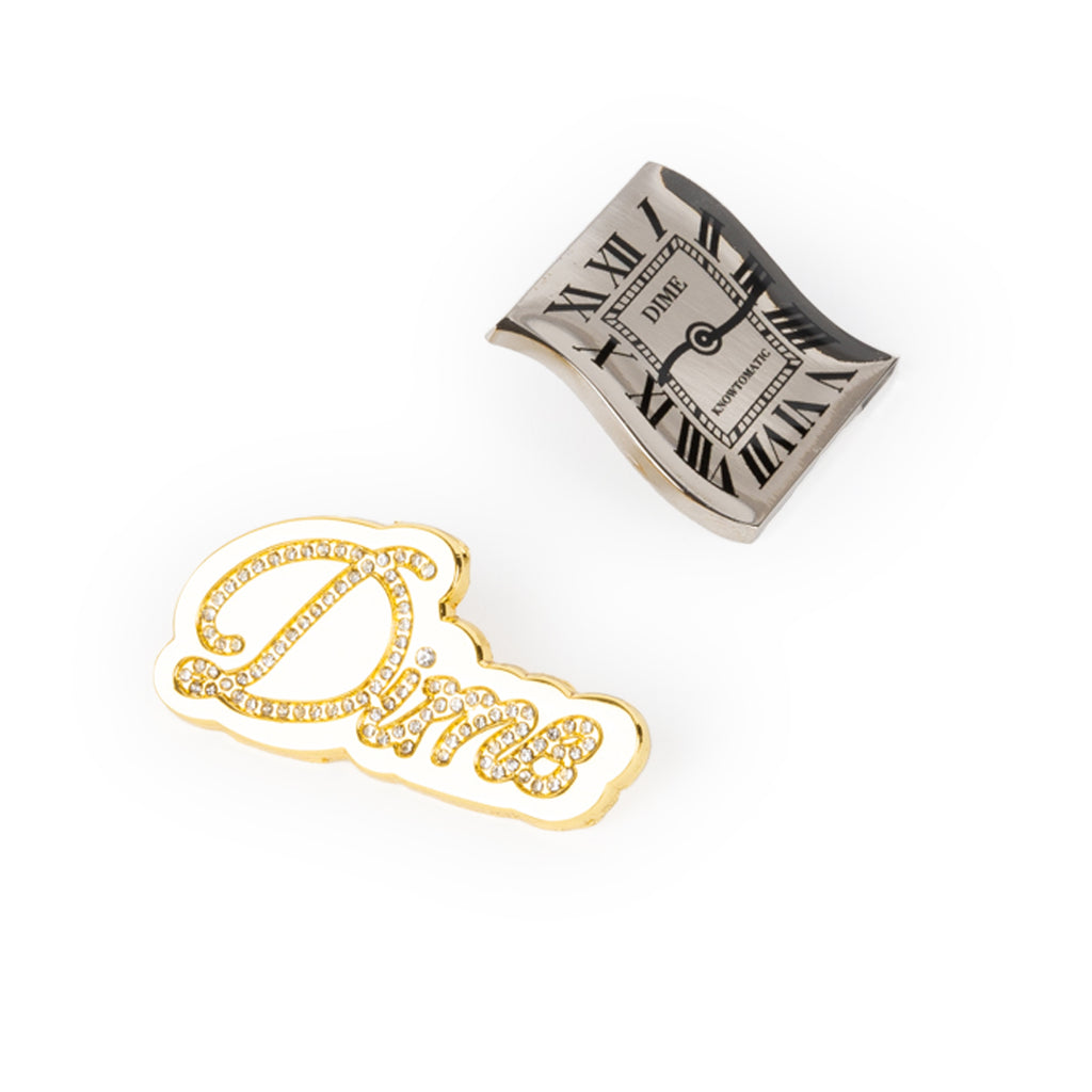 Gold 'Dime' necklace with a silver dime on a white background