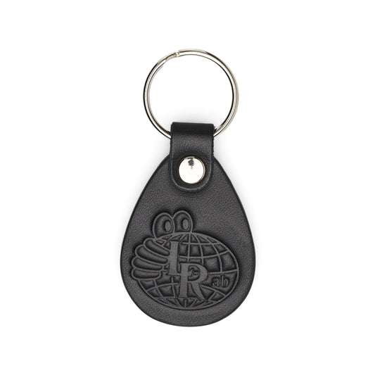Black leather keychain with embossed logo on a white background