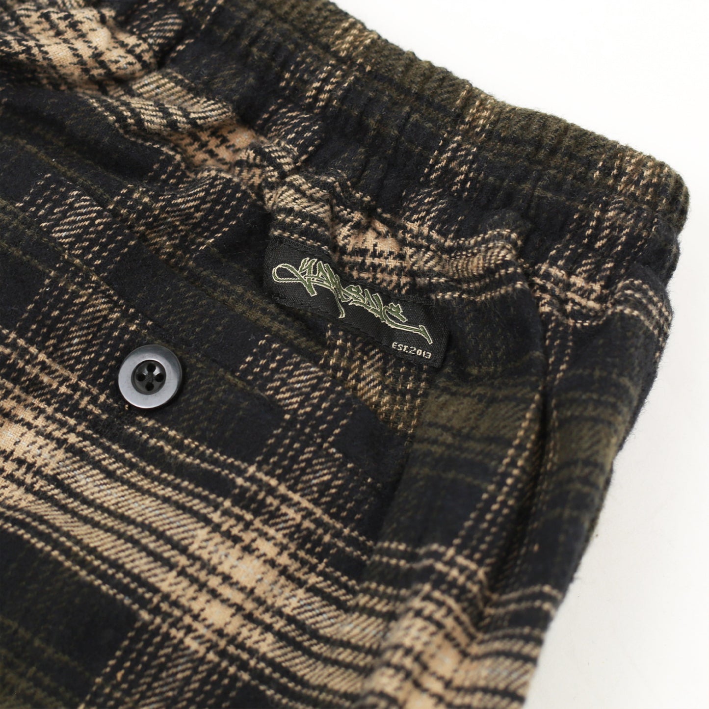 Elastic waistband and Yardsale logo tag on Shoreline plaid shorts brown
