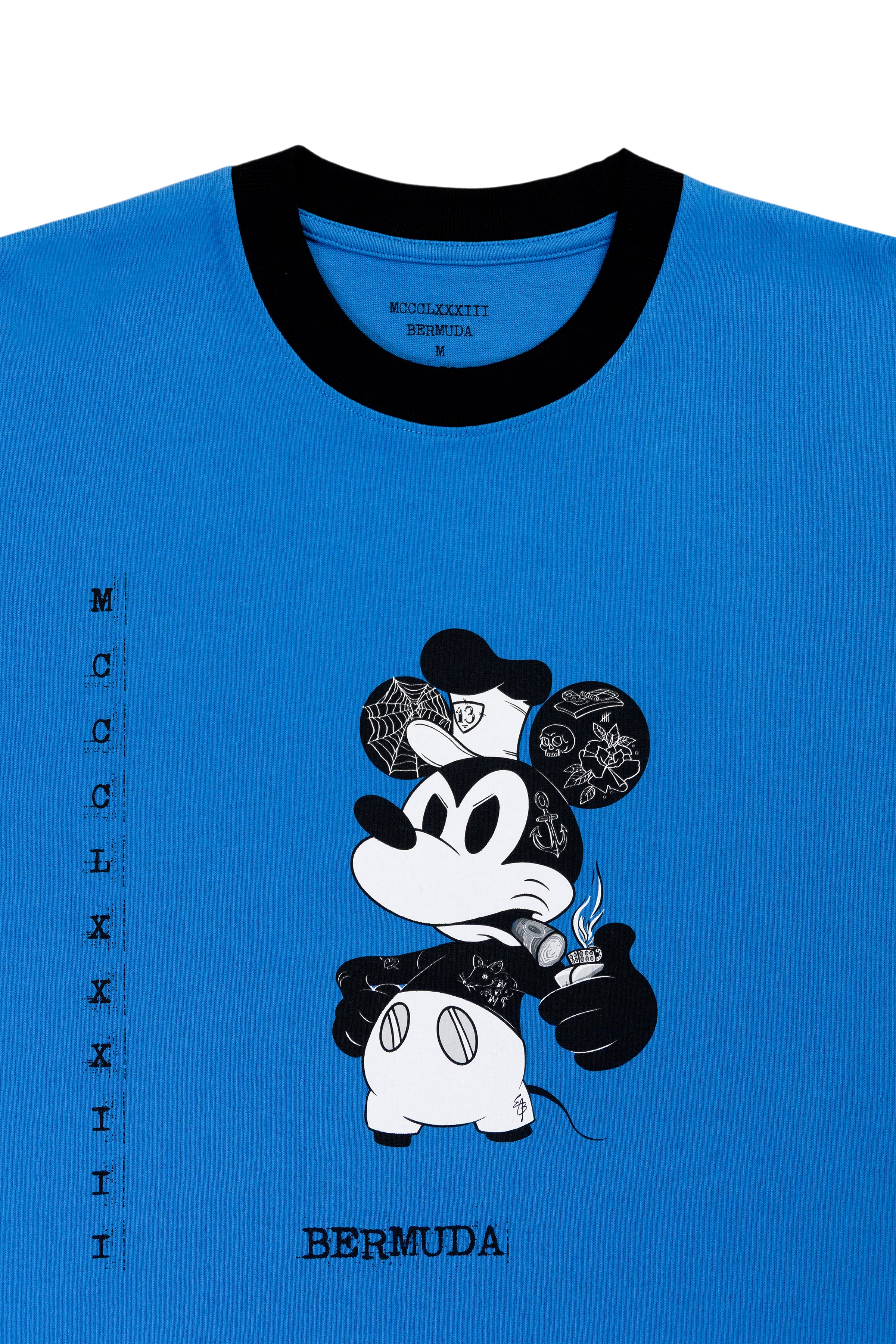 Blue t-shirt with a black and white graphic of a stylized mouse and text on a white background