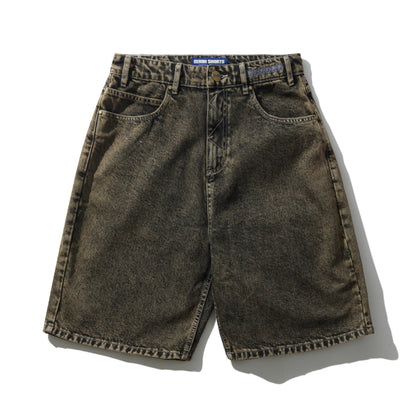 Brown denim shorts on a white background