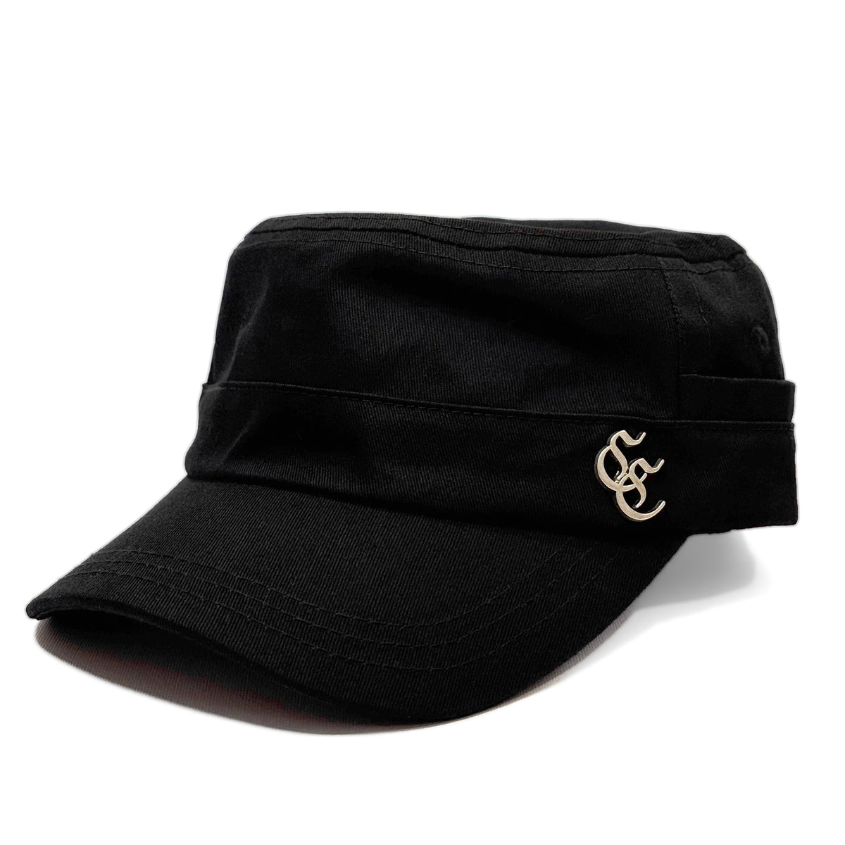 A black military-style cap with a curved brim and a small gold embroidered monogram logo on the side, shown against a plain white background.