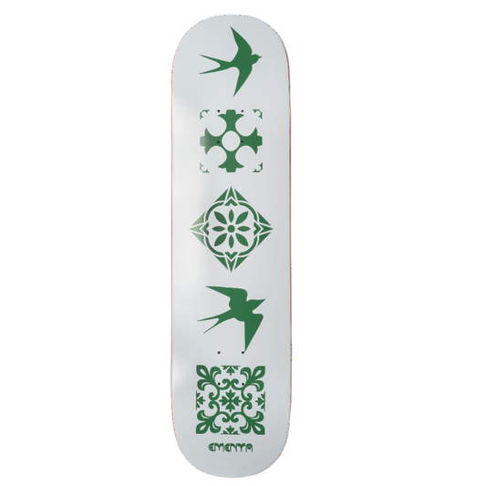 Skateboard deck with green geometric patterns on a white background