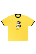 Yellow t-shirt with black trim featuring a cartoon character on a white background