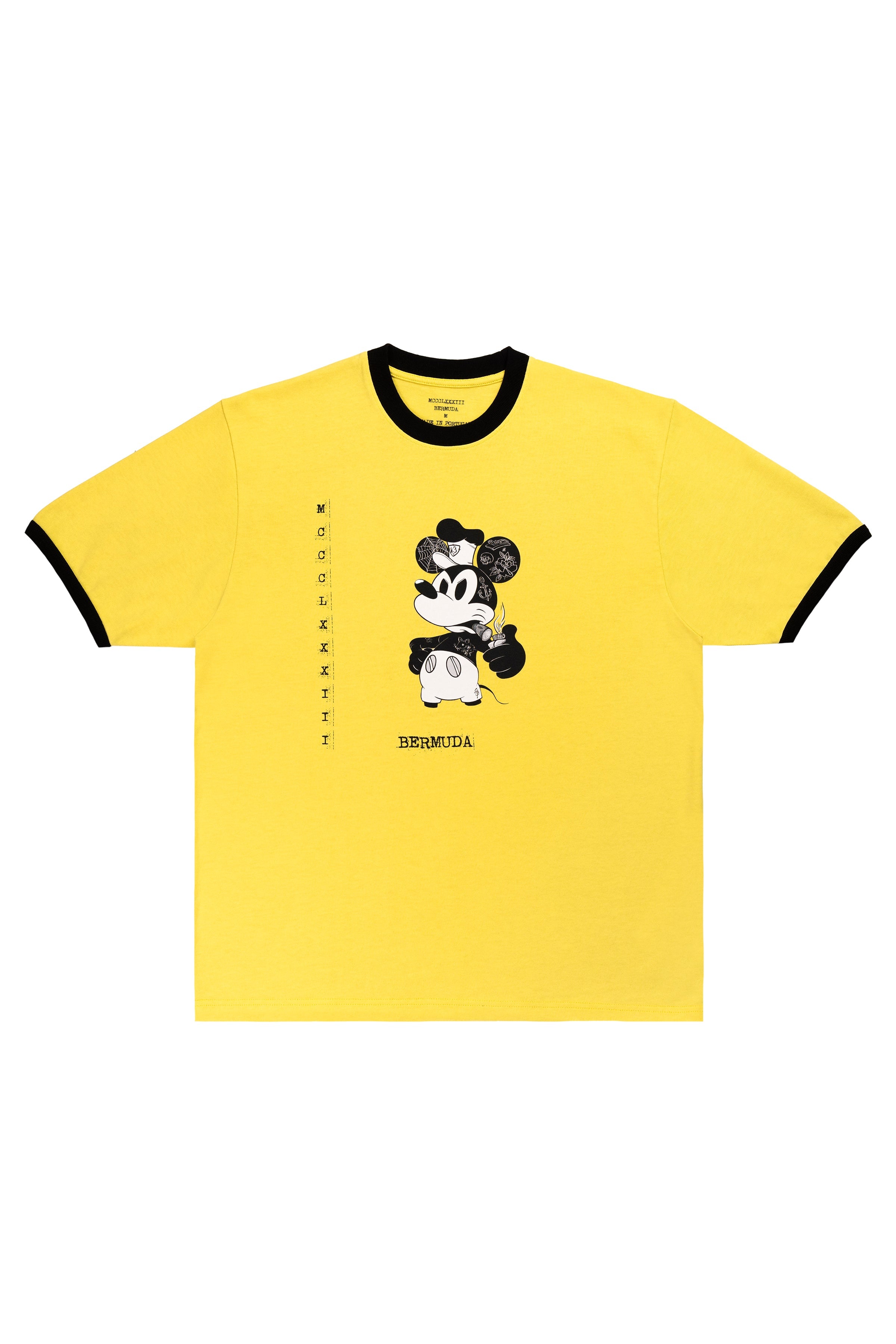 Yellow t-shirt with black trim featuring a cartoon character on a white background