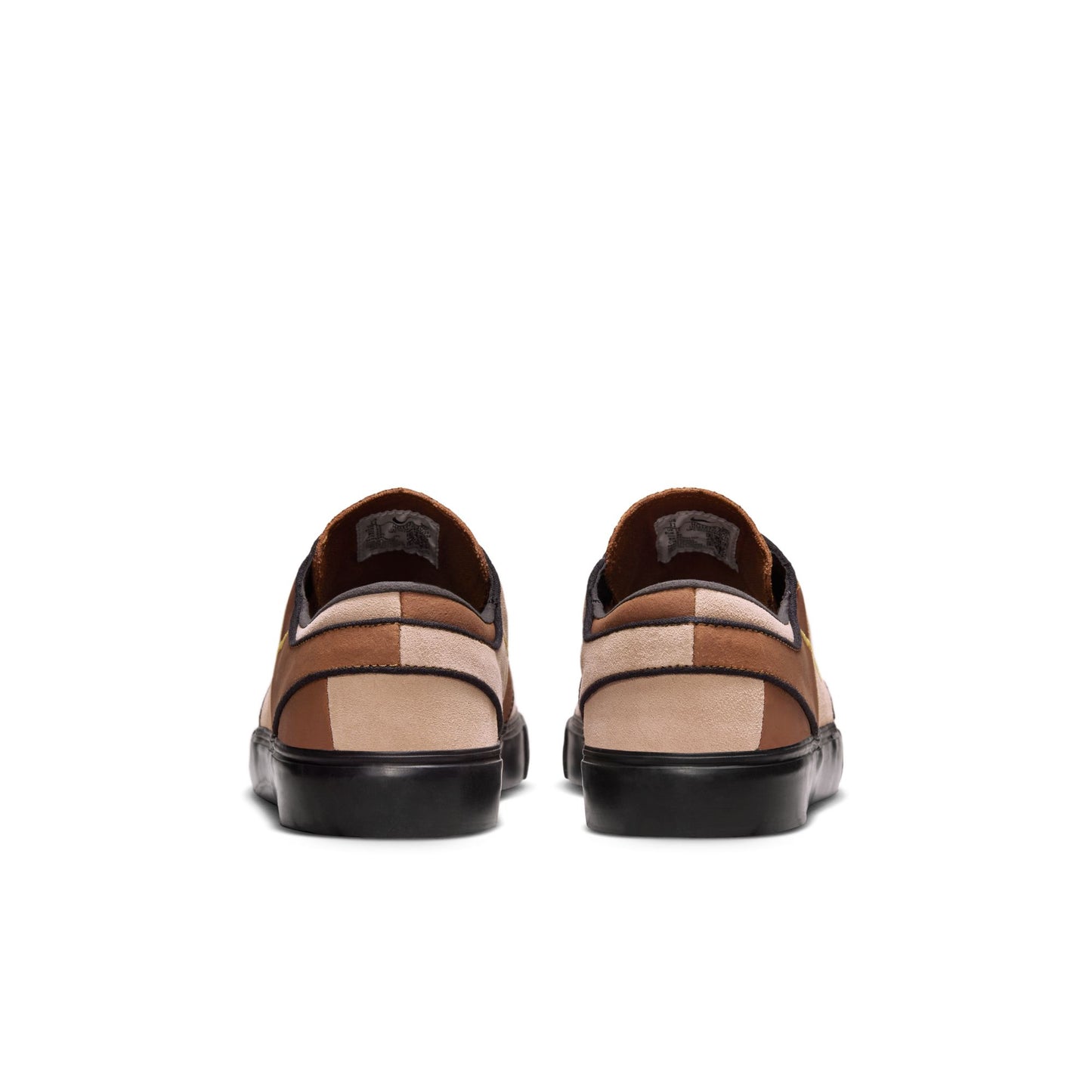 Pair of checkered loafers on a white background