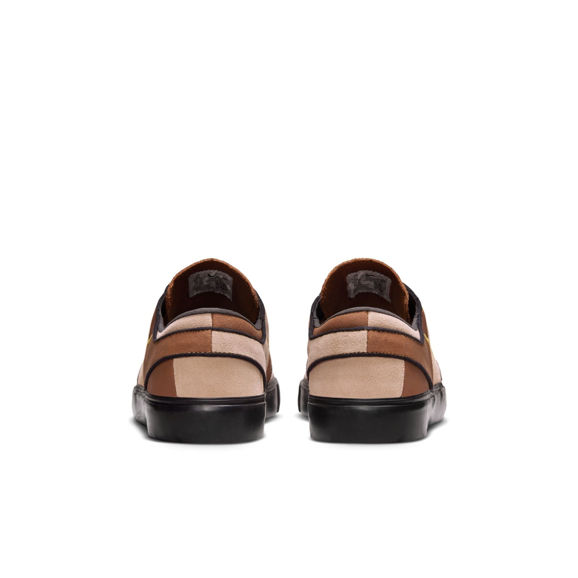 Pair of checkered loafers on a white background
