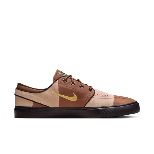 Brown and beige sneaker with Nike logo on a white background