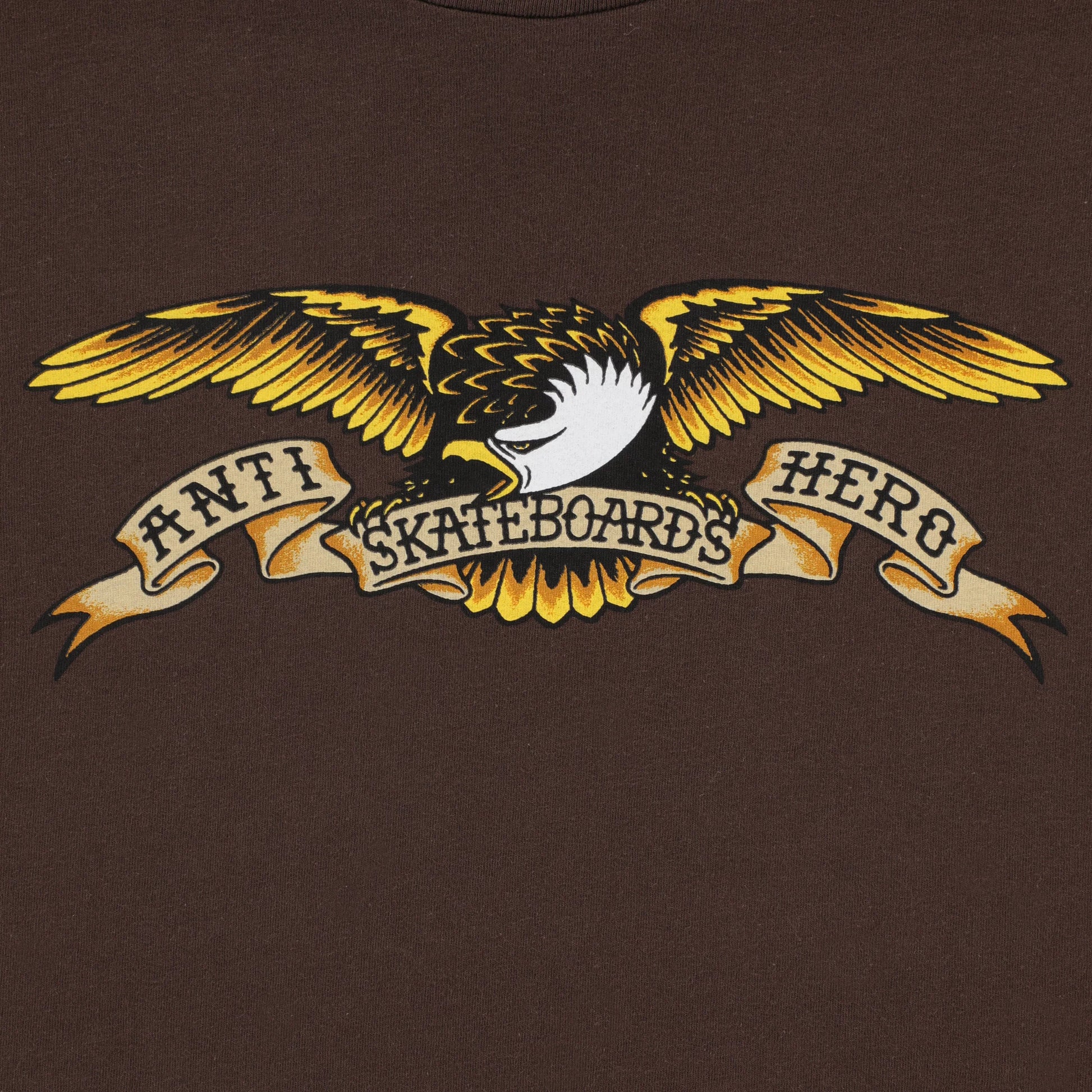Brown t-shirt with a yellow and black eagle graphic and text on a brown background