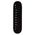 Black skateboard deck with Roman numeral design on a white background