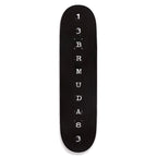 Black skateboard deck with white text on a white background