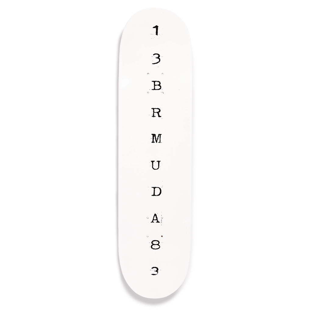 White skateboard deck with black text on a white background