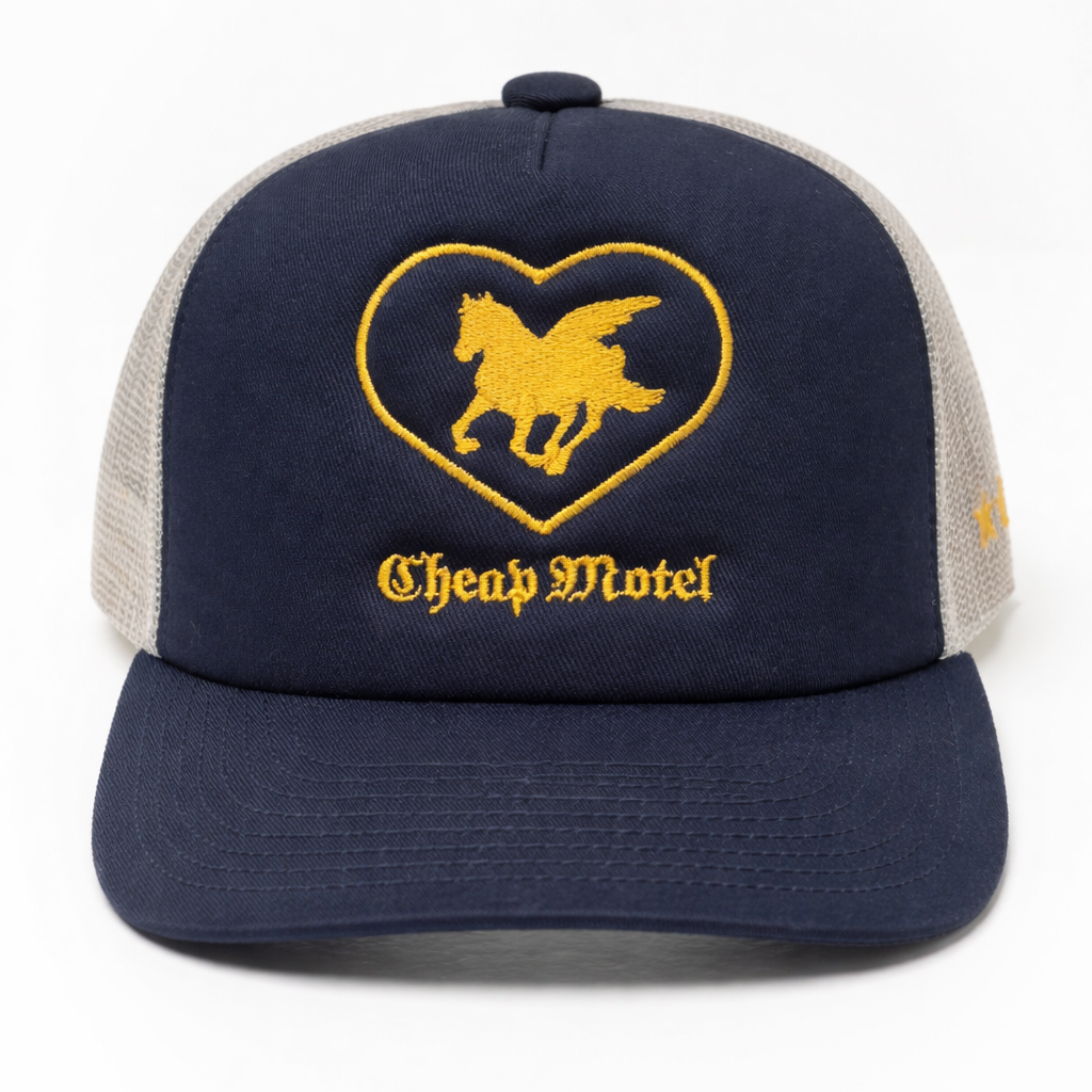Navy blue and beige cap with a heart-shaped logo and 'Cheap Motel' text on a white background