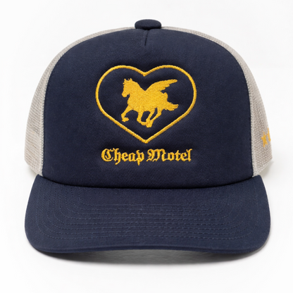 Navy blue and beige cap with a heart-shaped logo and 'Cheap Motel' text on a white background