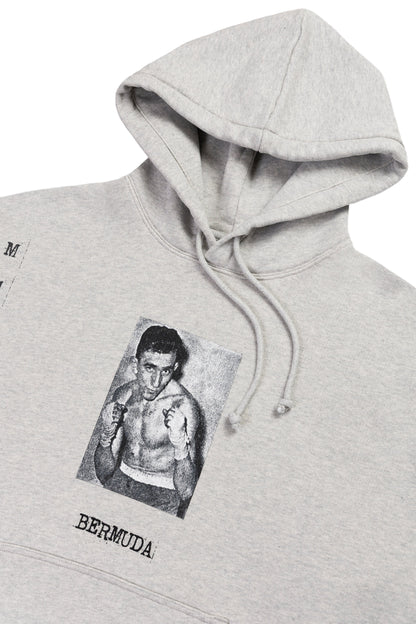 Gray hoodie with a graphic of a boxer and 'Bermuda' text on a white background