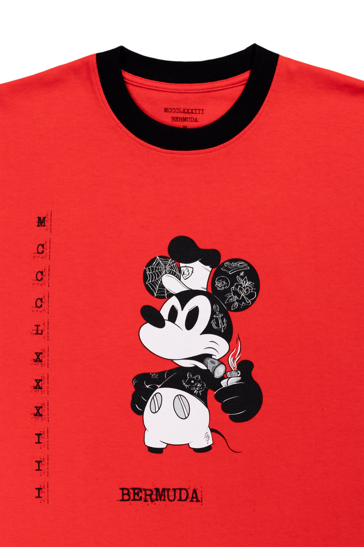 Red t-shirt with a graphic of a character holding a bottle labeled 'Bermuda' on a white background.