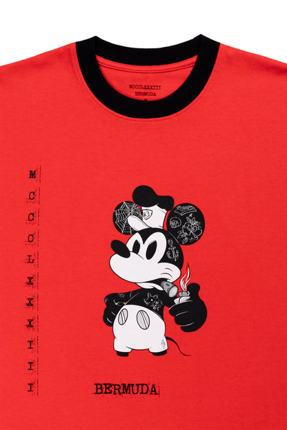 Red t-shirt with a graphic of a character holding a bottle labeled 'Bermuda' on a white background.
