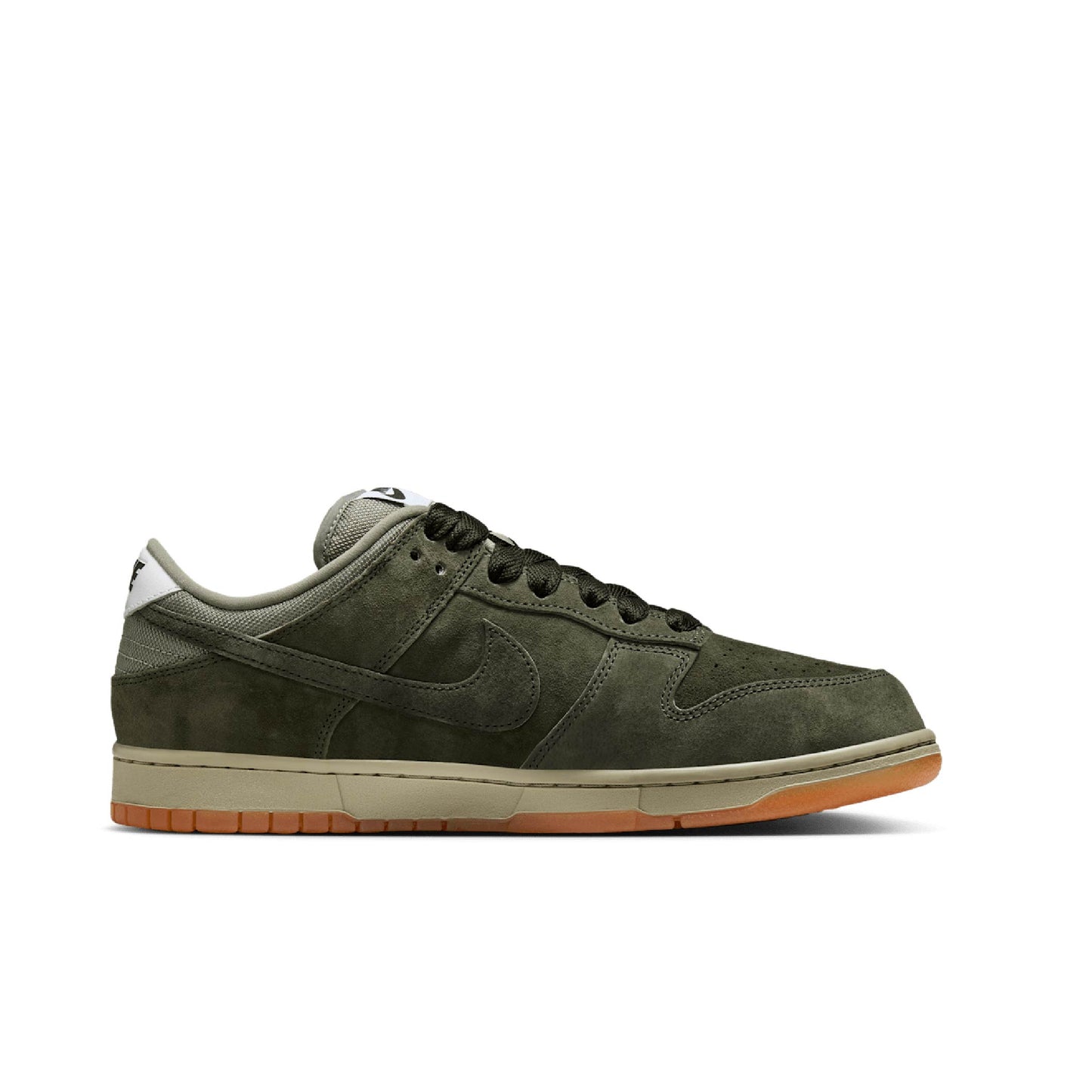 Green sneaker with brown sole on a white background nike sb pro b
