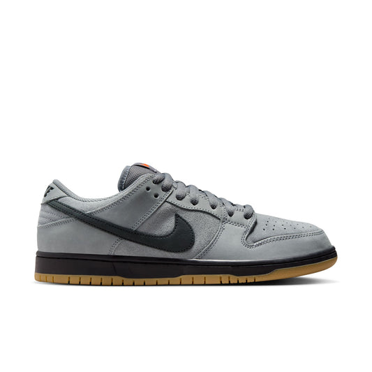 Gray sneaker with black swoosh logo on a white background
