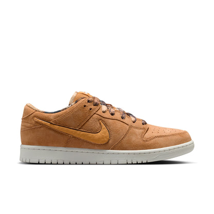 Brown sneaker with white sole on a white background