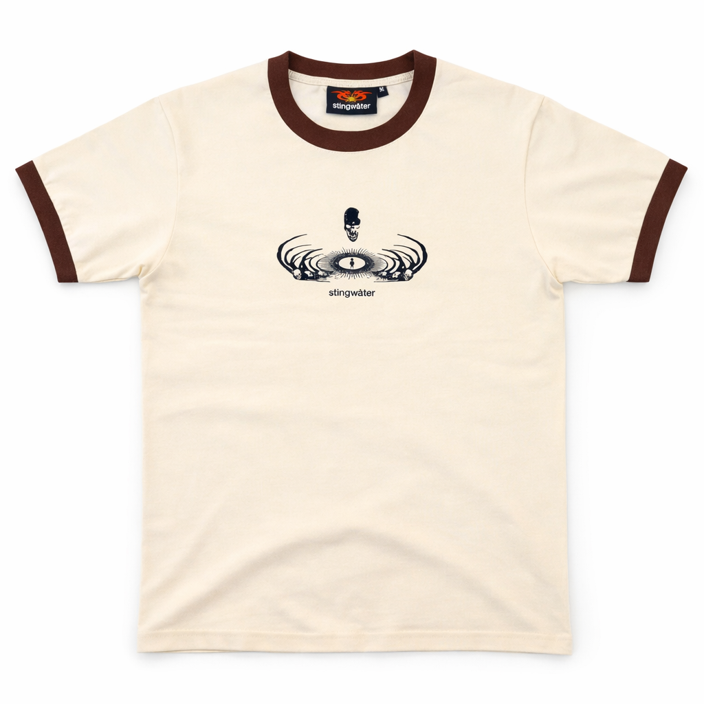 Beige t-shirt with brown trim featuring a logo on a white background