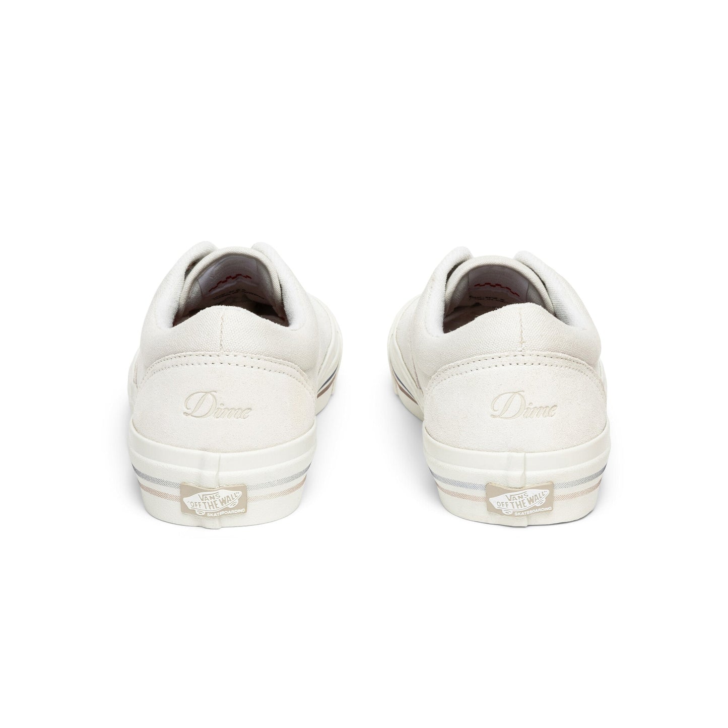White sneakers with a brand logo on a white background