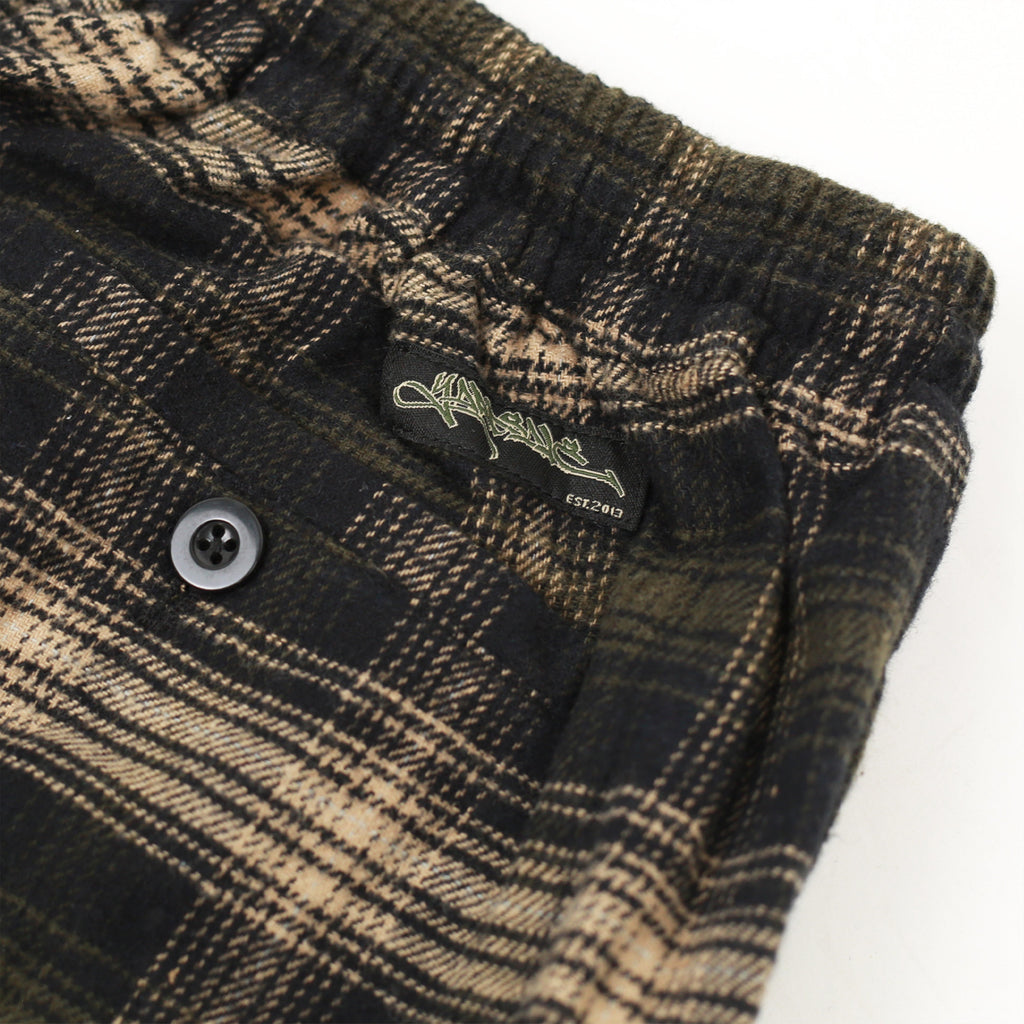 Elastic waistband and Yardsale logo tag on Shoreline plaid shorts brown