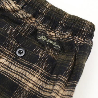 Elastic waistband and Yardsale logo tag on Shoreline plaid shorts brown